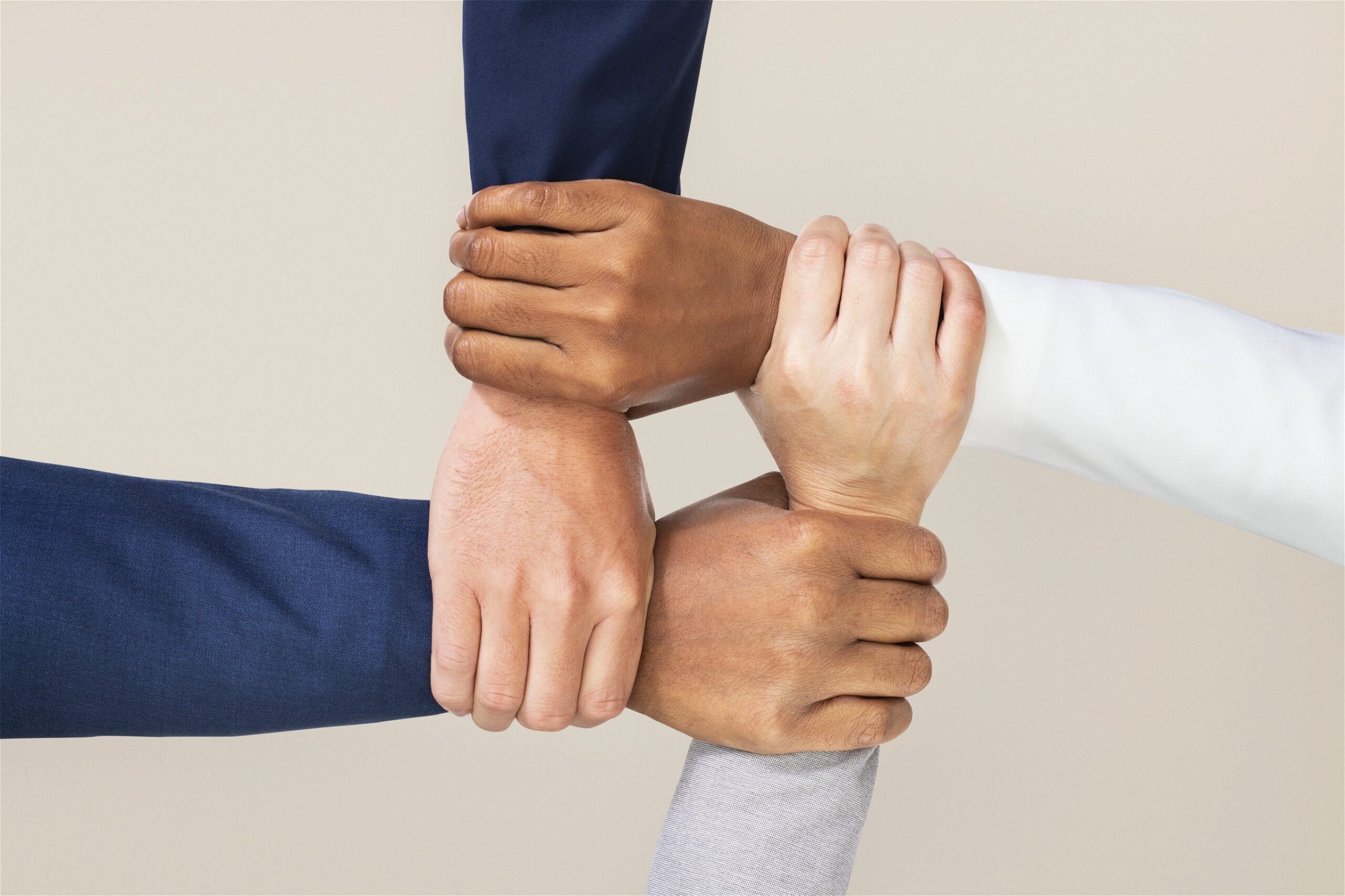 Diverse hands united business teamwork gesture