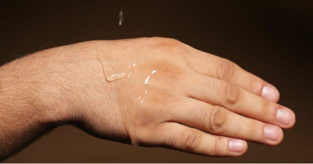 hand with Ayurvedic Lube on it