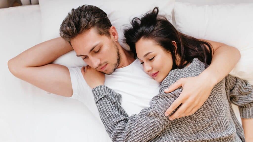 couple sleeping peacefully showing abstinence